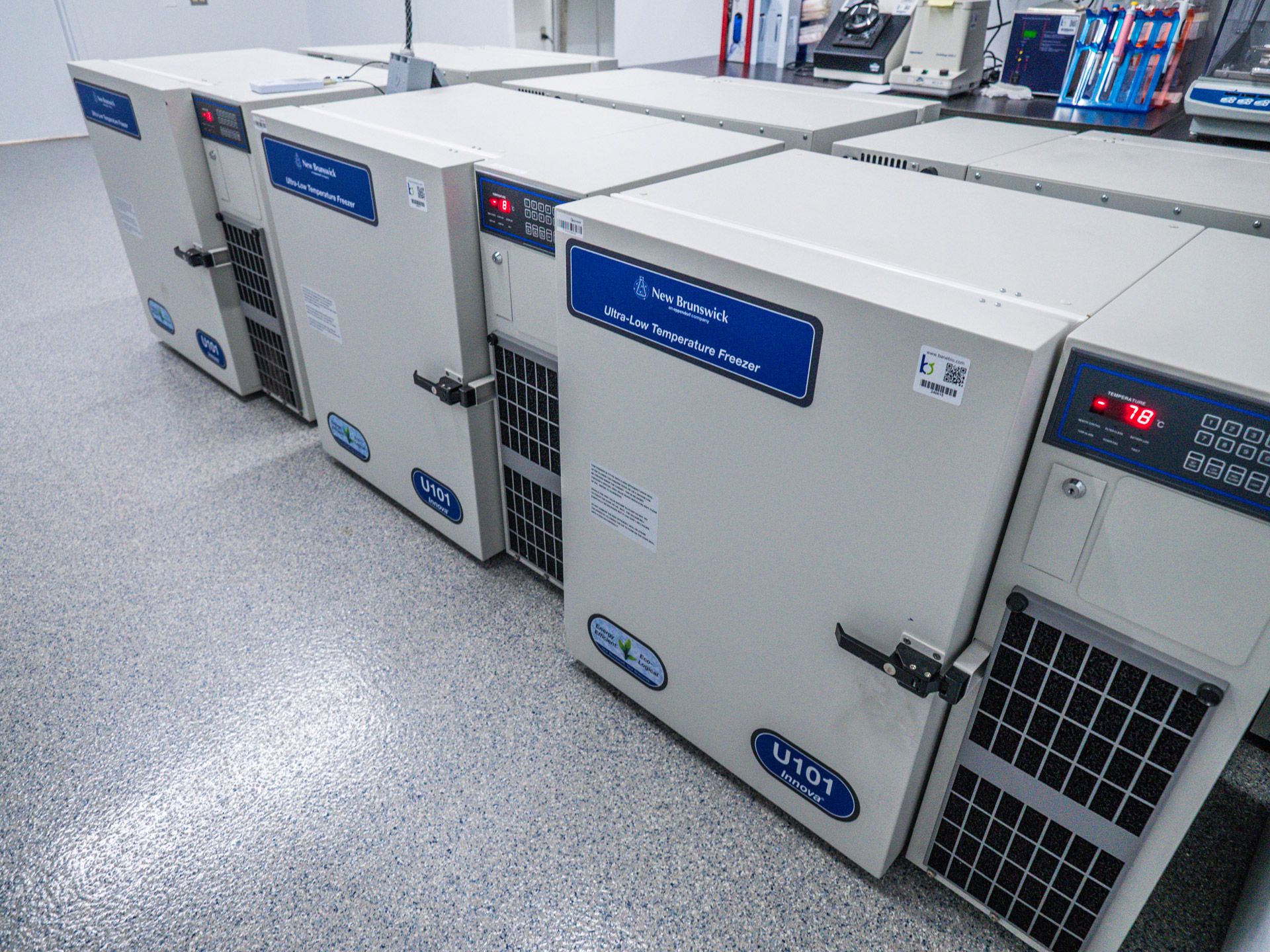 An assortment of laboratory freezers in a lab space